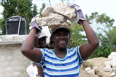 Rose marie carries stones for pay to feed family